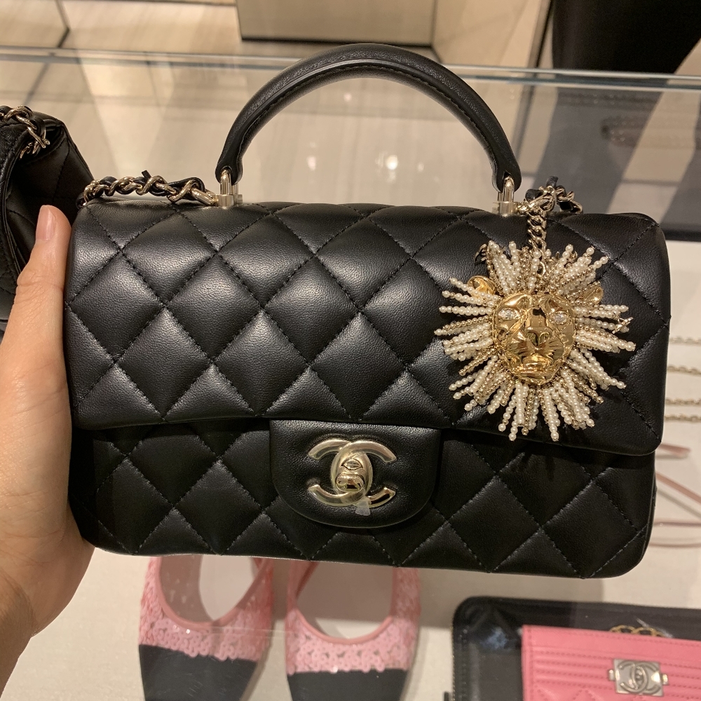 Chanel Mini Flap Bag with Lion charm